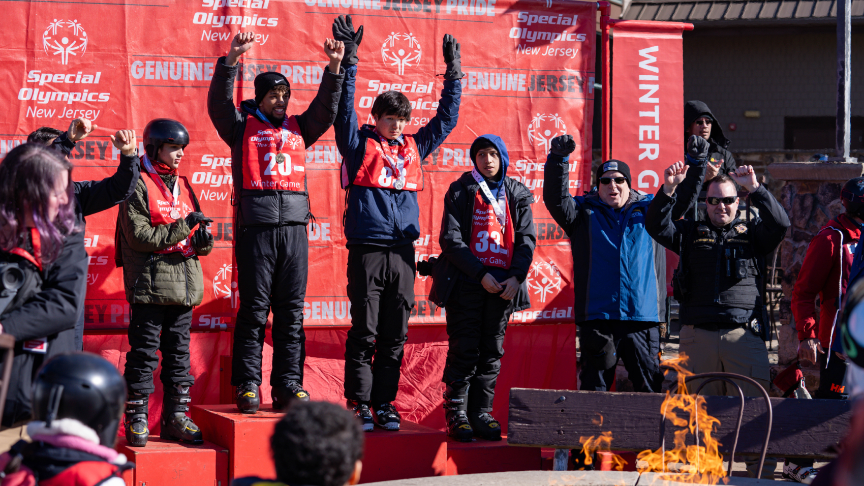 Athletes Gene Martin, Dioscar Marcelino, Joontae Hwang, and Gabriel Rojas are given their medals for the alpine skiing event during the Special Olympics New Jersey at Mountain Creek in Vernon, New Jersey on Tuesday, February 6, 2024.