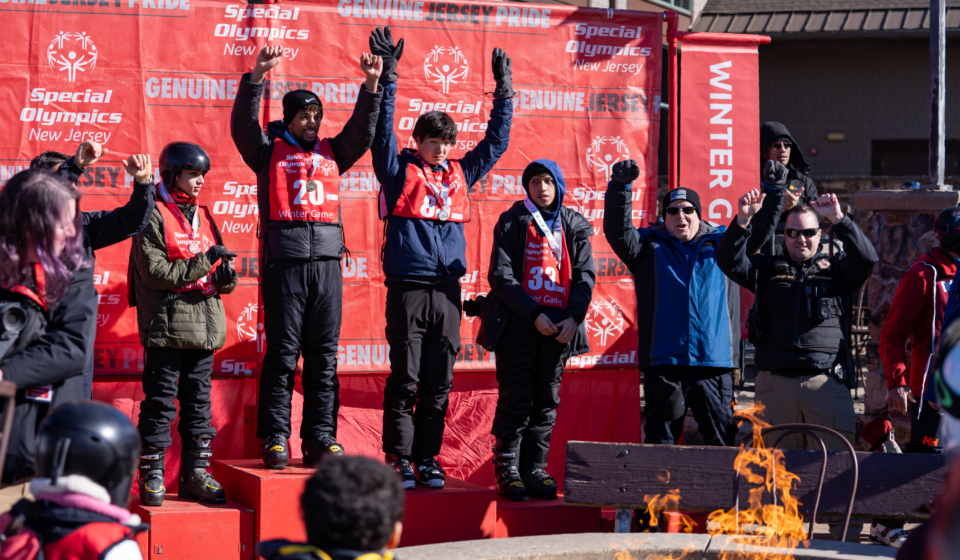 Athletes Gene Martin, Dioscar Marcelino, Joontae Hwang, and Gabriel Rojas are given their medals for the alpine skiing event during the Special Olympics New Jersey at Mountain Creek in Vernon, New Jersey on Tuesday, February 6, 2024.
